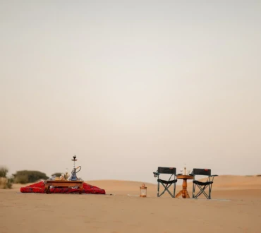 Bonfire on desert dunes